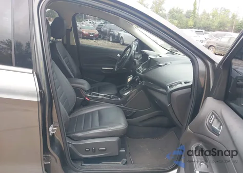 2015 Ford Escape Titanium from USA, damaged, VIN 1FMCU9J9XFUB27158